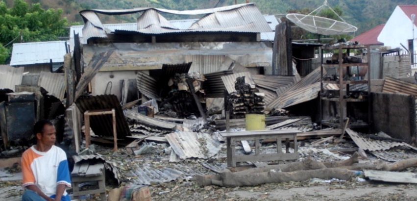 Timor-Leste, neighborhood destroyed in internal violence, April 2006.